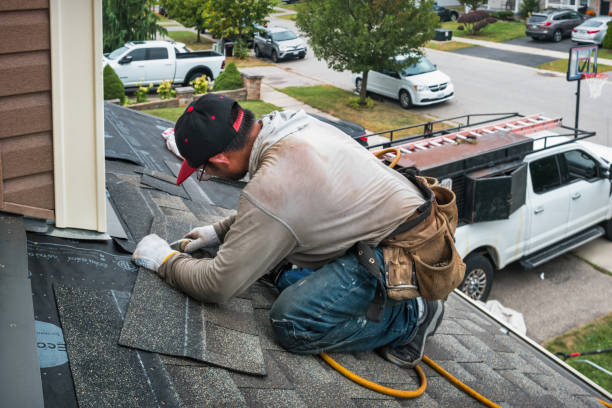 Professional Roofing technician working in Troutman, NC